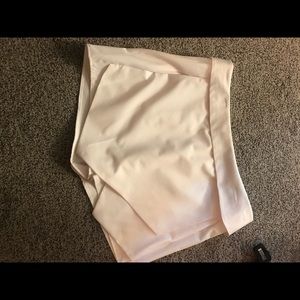 2 skorts, Black pair and white pair